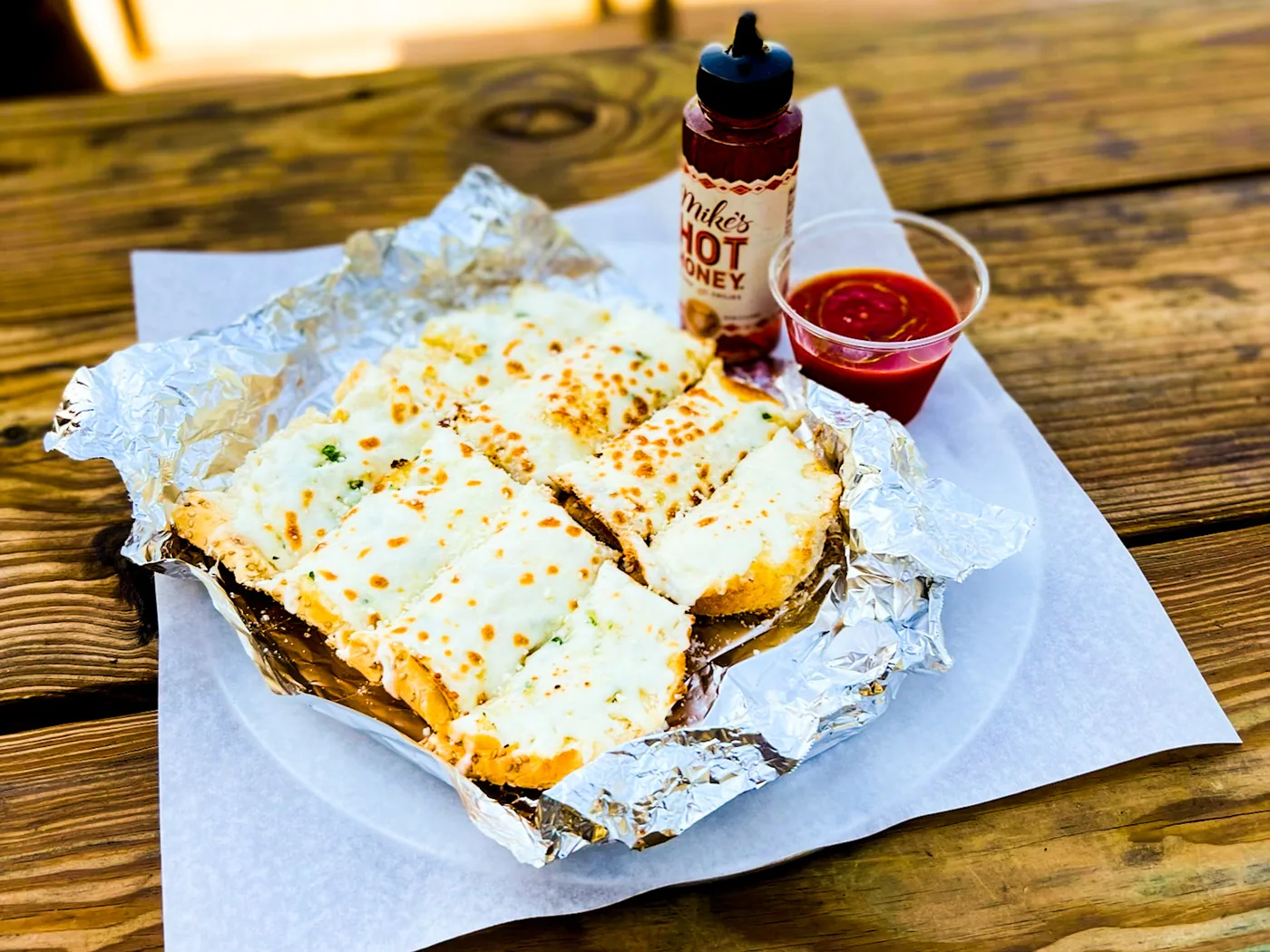 Cheesy garlic bread, a pop-up favorite that joined the menu